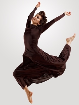 Image of a person holding his feet