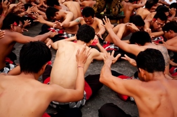 Image of a person holding his feet