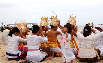 Image of a person holding his feet